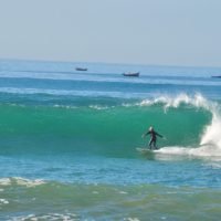 surf woman morocco