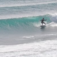 surfing a wave taghazout